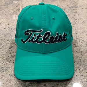 Titleist hat. Adjustable strap. Color green